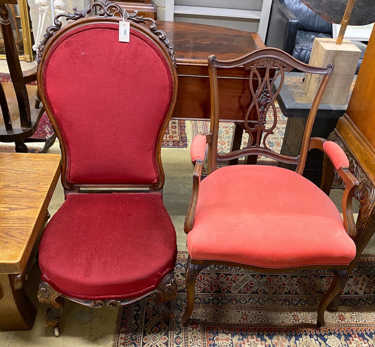 A Victorian mahogany upholstered nursing chair and an Edwardian upholstered mahogany elbow chair